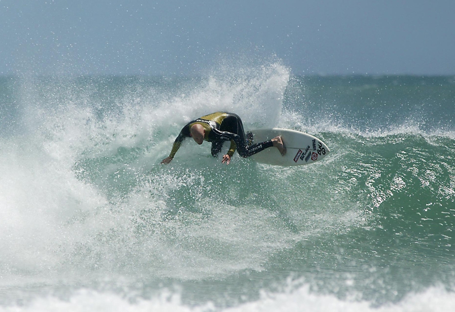 Click to view larger image Taranaki surfer