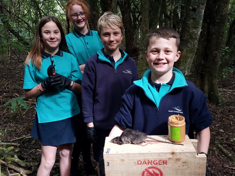 Coastal Taranaki School students trapping predators to protect biodiversity. Young trappers protecting biodiversity