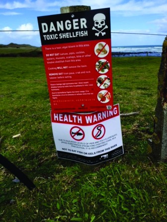 The lower sign at Kina Road relates to PFAS contamination.
