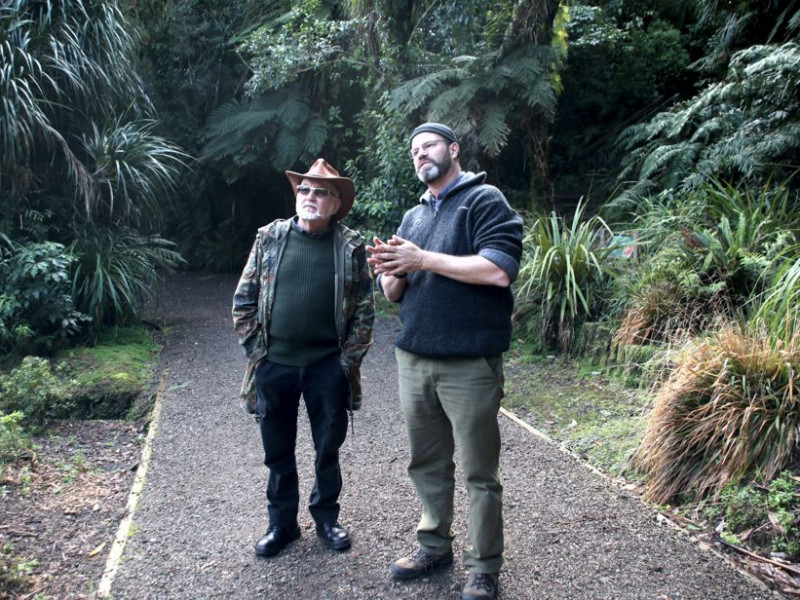 SIZING IT ALL UP: Plant breeder and Royal NZ Institute of Horticulture president Dr Keith Hammett, left, with Pukeiti’s Rhododendron Collection and Projects Officers, Andrew Brooker, at the gardens recently. Keith Hammett and Andrew Brooker